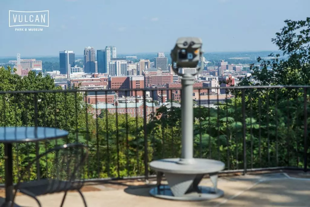 coin operated viewer overlooking birmingham skyline at the vulcan
