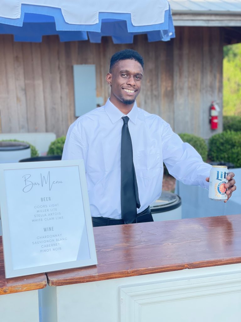 BNB Beverage Management Bartender serving alcohol at outside bar parker hill