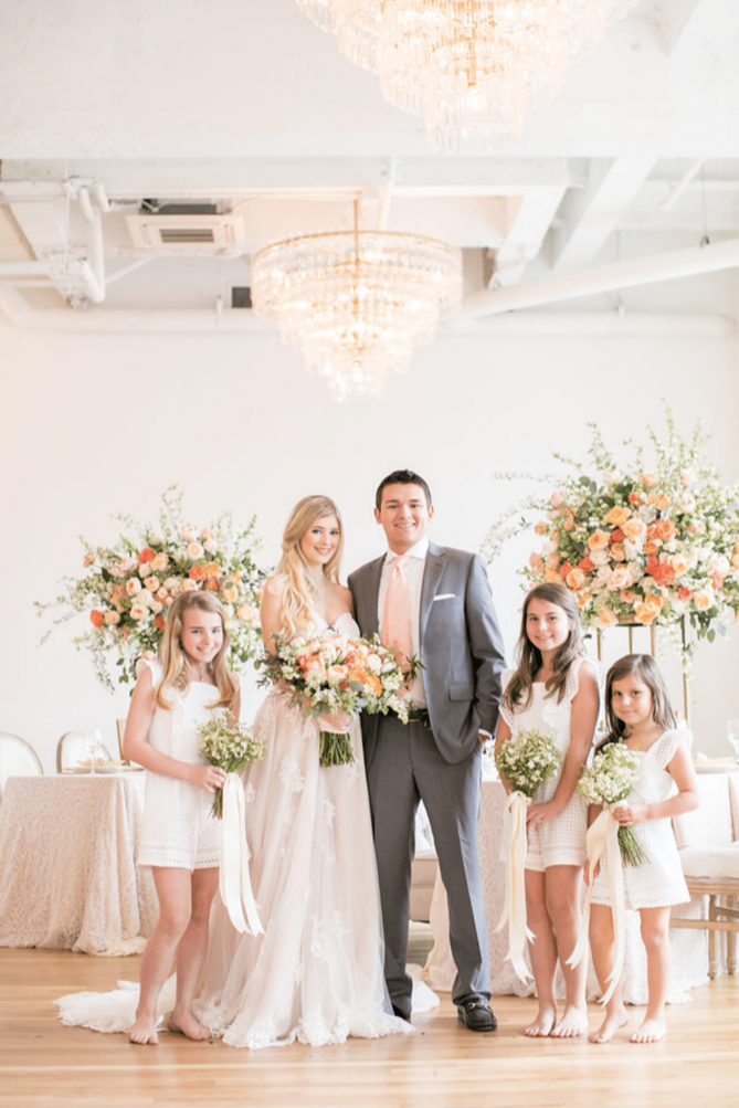 Wedding family portrait with florals at kress building