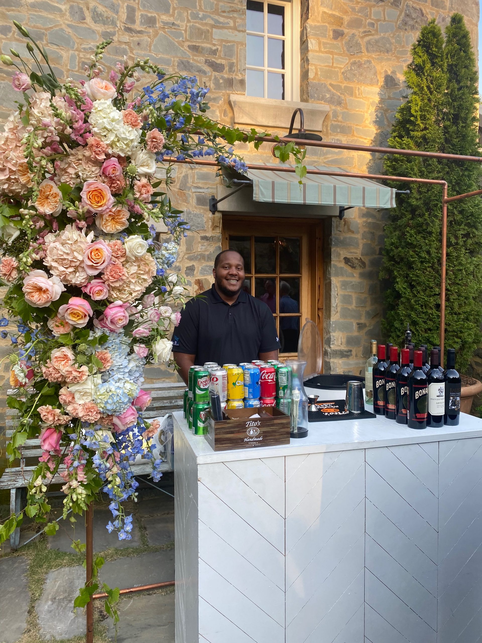 wedding premium bar with florals bnb beverage management bartender