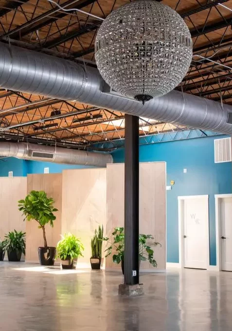 circular glass chandeliers inside avenue d event space