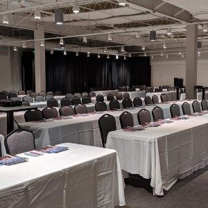 tables and chairs set up for business event cook museum