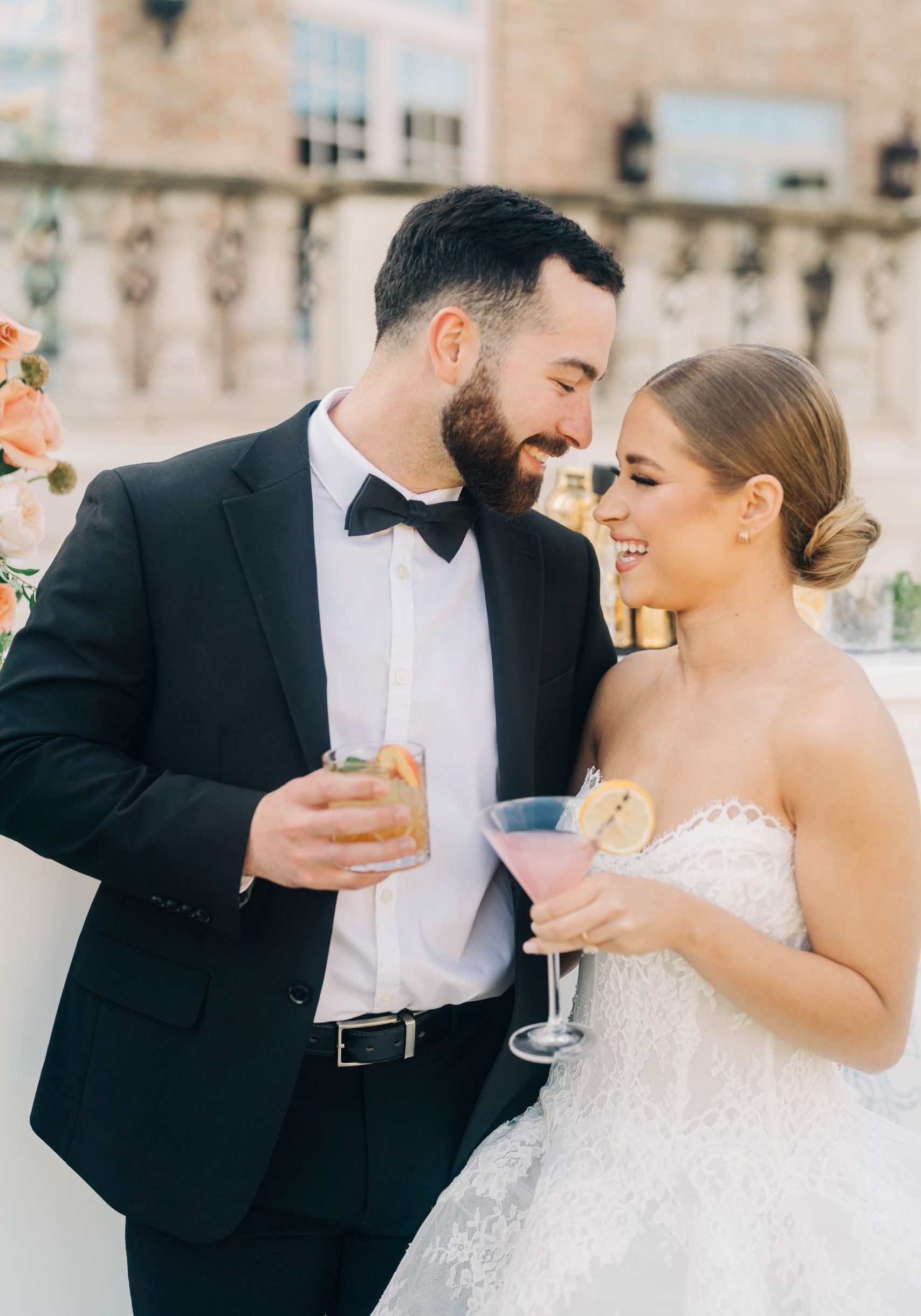 Bride and groom holding BNB beverage management signiture cocktails at fountainview mansion