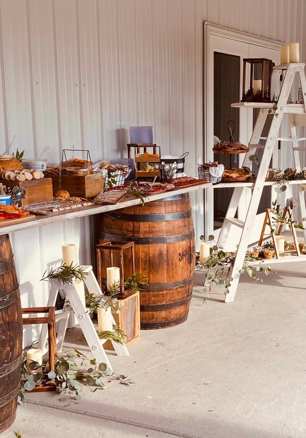 rustic table and shelves with food and drink