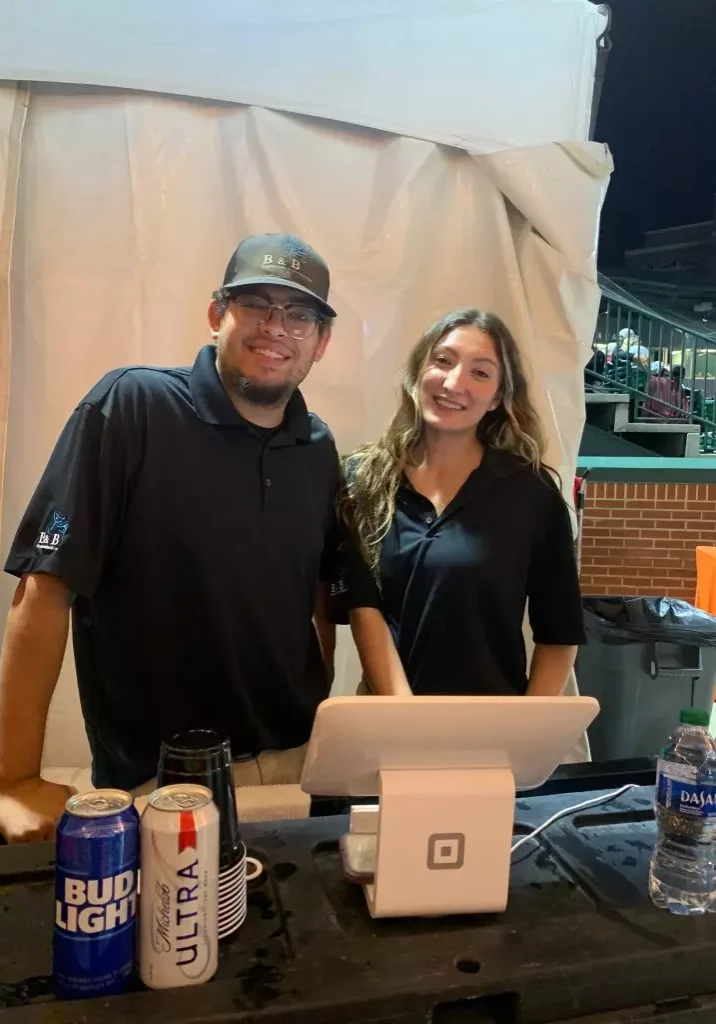 AU BASEBALL serving cold beer bnb beverage managemet bartenders at hitchcock field at plainsman park