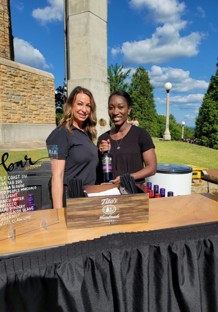 BNB beverage management bartenders serving alcohol outside bar the vulcan